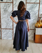 Load image into Gallery viewer, CHARCOAL BLACK PUFFED SLEEVES TOP WITH TIE UP DETAIL PAIRED WITH FLARED PANTS
