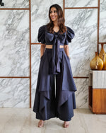 Load image into Gallery viewer, CHARCOAL BLACK PUFFED SLEEVES TOP WITH TIE UP DETAIL PAIRED WITH FLARED PANTS
