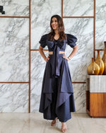 Load image into Gallery viewer, CHARCOAL BLACK PUFFED SLEEVES TOP WITH TIE UP DETAIL PAIRED WITH FLARED PANTS
