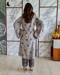 GREY LEAF PRINT JACKET WITH POLKA DOTS SPAGHETTI BUSTIER AND HAREM PANTS