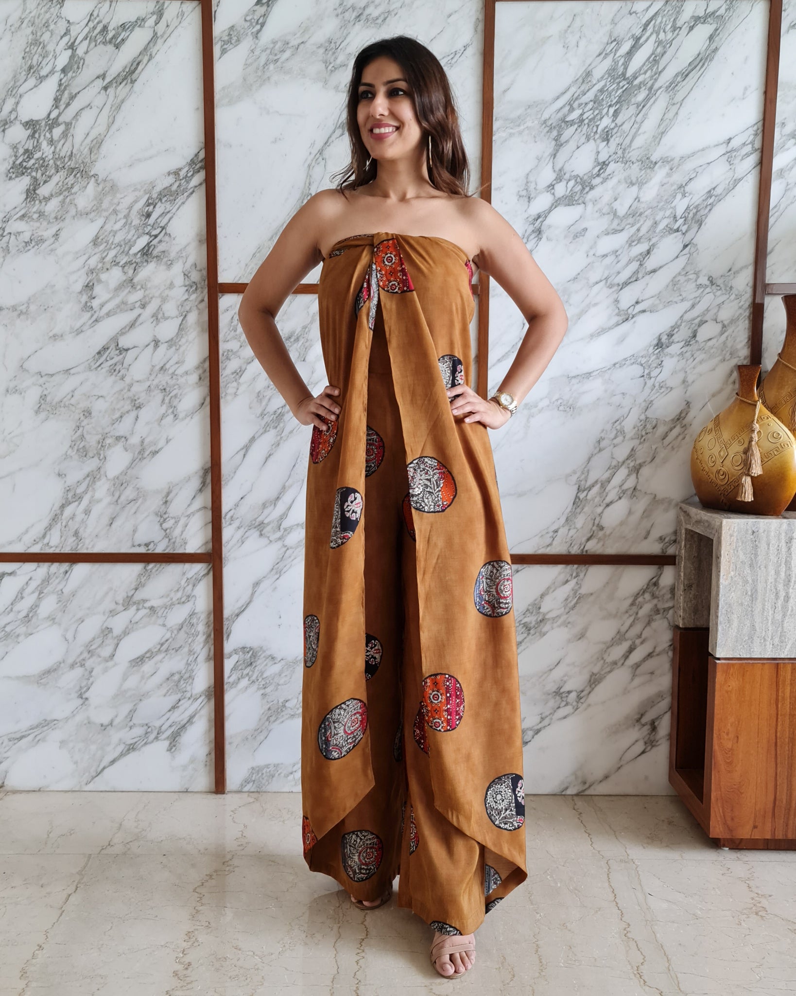 MUSTARD PRINTED HALTER NECK FLARED JUMPSUIT