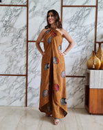 Load image into Gallery viewer, MUSTARD PRINTED HALTER NECK FLARED JUMPSUIT

