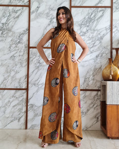 MUSTARD PRINTED HALTER NECK FLARED JUMPSUIT