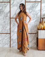 Load image into Gallery viewer, MUSTARD PRINTED HALTER NECK FLARED JUMPSUIT
