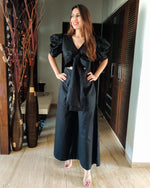 Load image into Gallery viewer, BLACK FRONT TIE UP AND PUFFED SHORT SLEEVED JUMPSUIT
