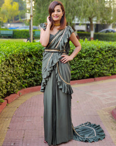 GREEN RUFFLE SKIRT SAREE WITH FRILLED BLOUSE