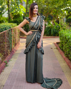 GREEN RUFFLE SKIRT SAREE WITH FRILLED BLOUSE
