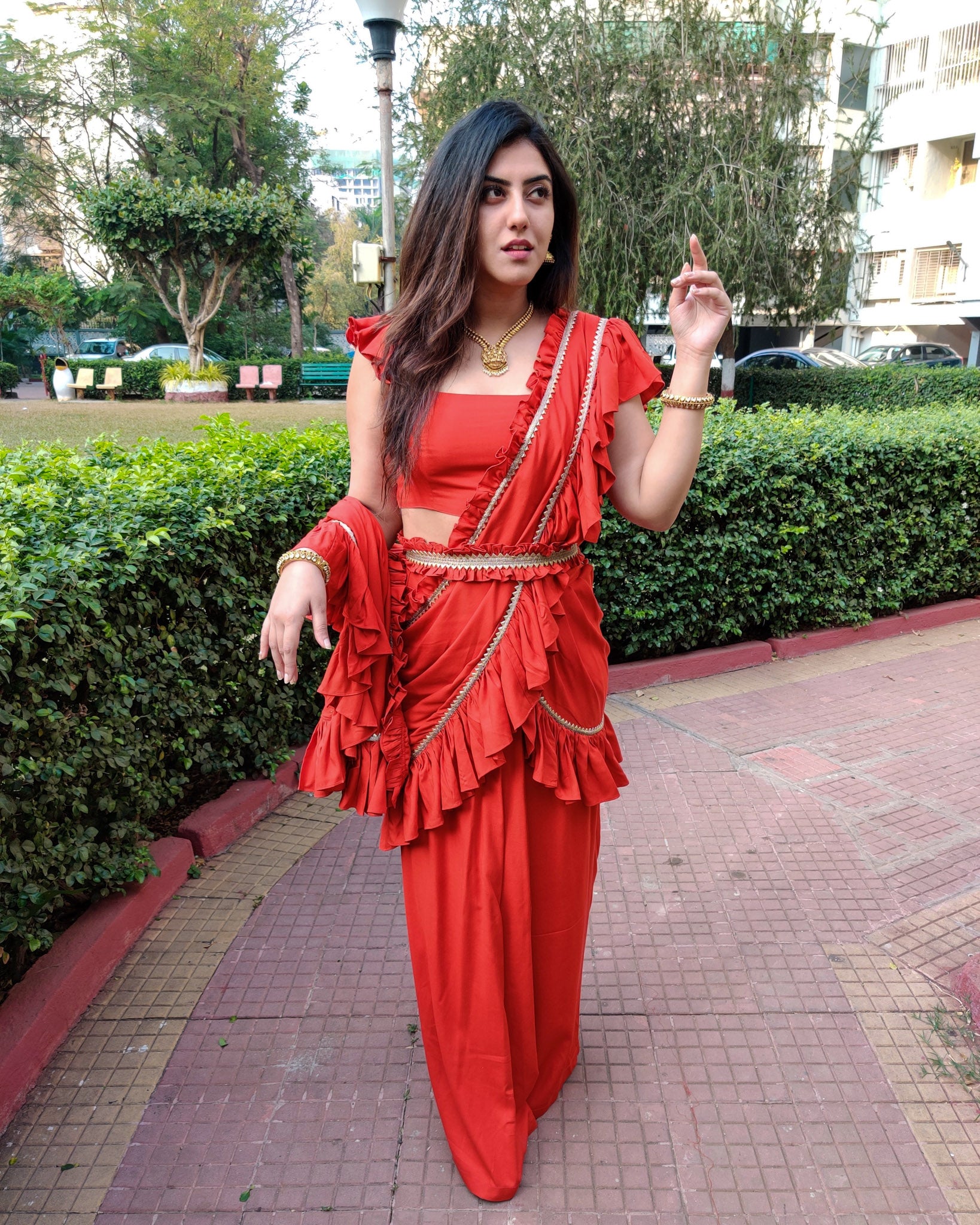RED RUFFLE SKIRT SAREE WITH FRILLED BLOUSE